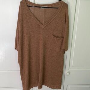 Brown short sleeve v neck pocket side slits raw hem. NWOT